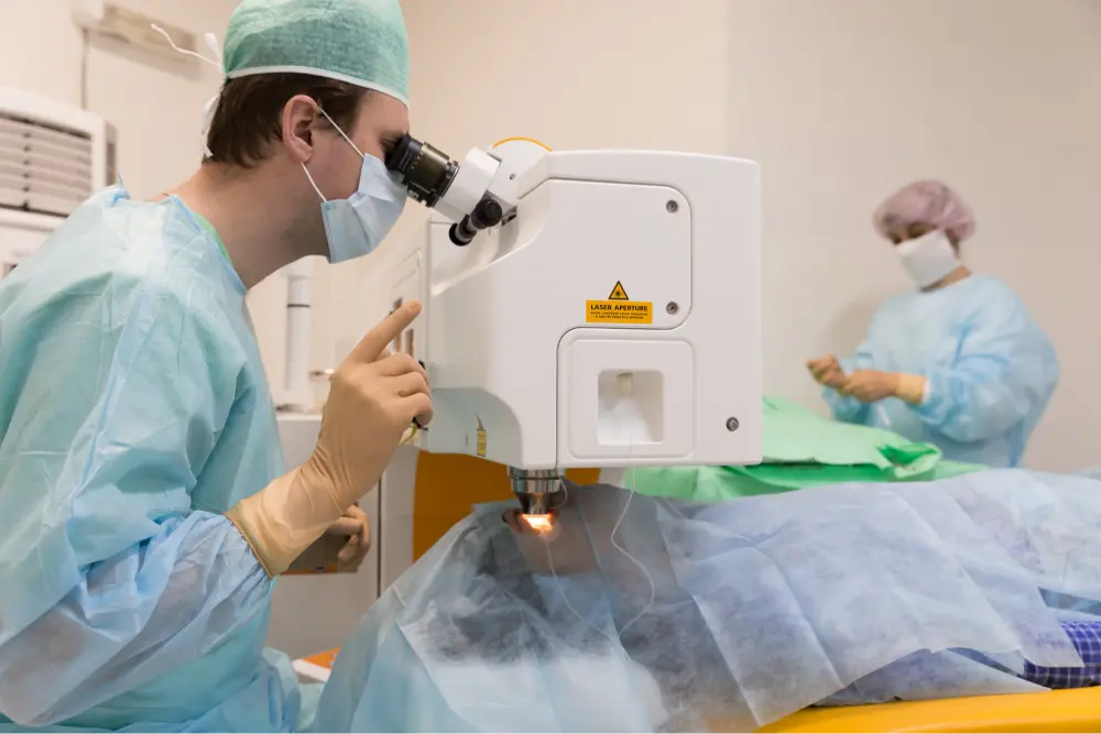 A doctor performing an eye surgery on a patient.